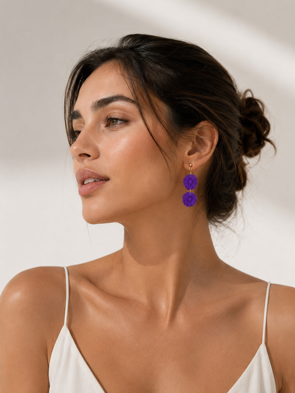 Pendientes de margaritas morados