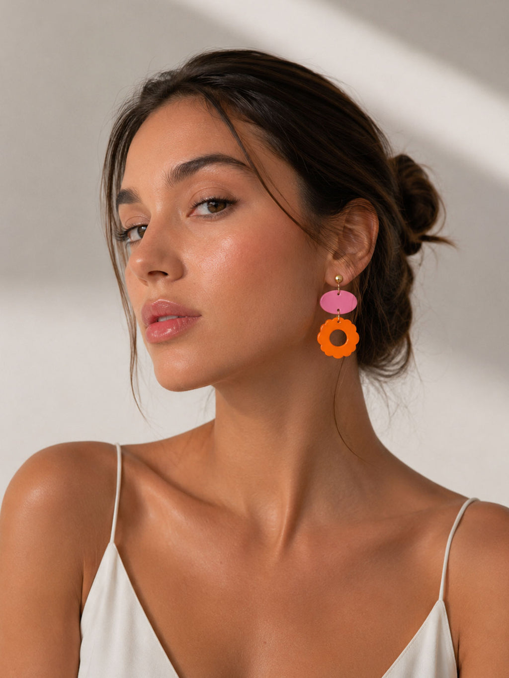 Pendientes flor naranja detalle rosa texturizados