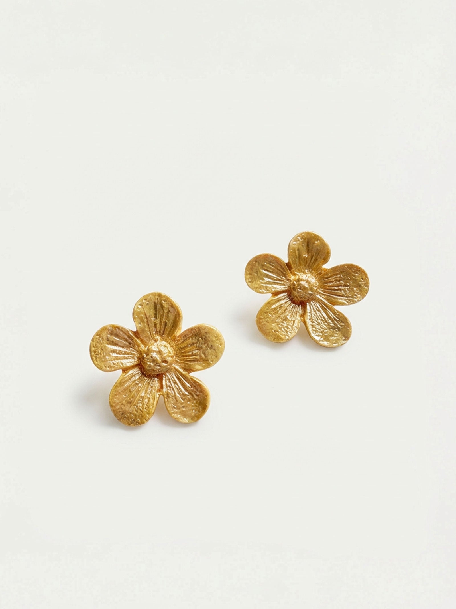 Pendientes botón flor