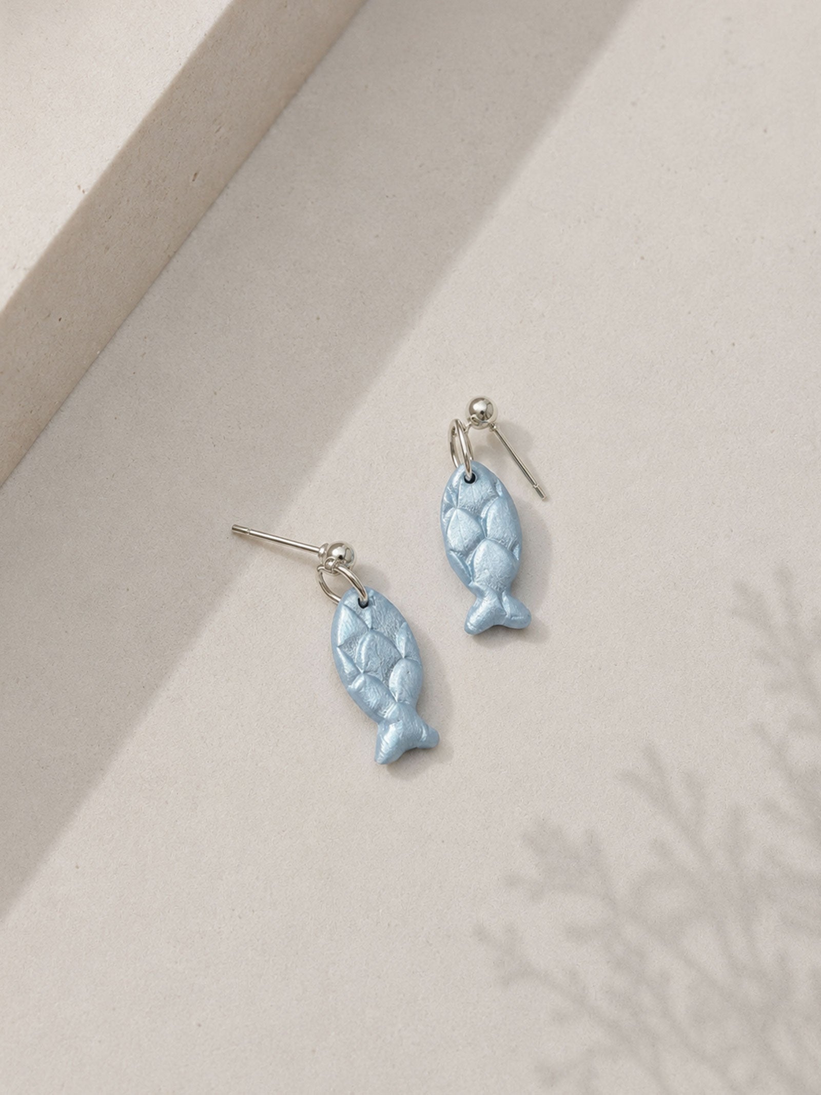 Pendientes scales